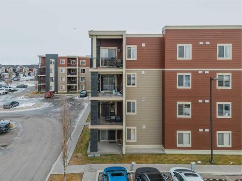 218-15 Saddlestone Way Ne, Calgary, AB - Outdoor With Balcony With Facade