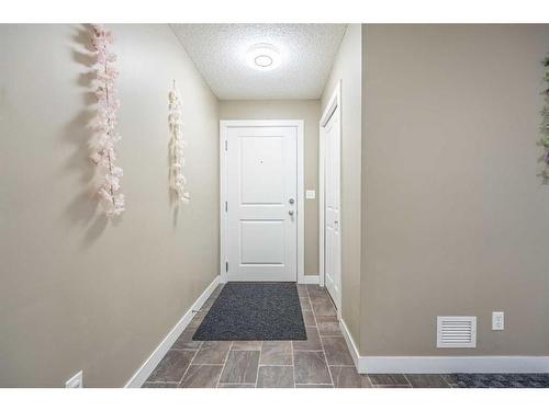 218-15 Saddlestone Way Ne, Calgary, AB - Indoor Photo Showing Other Room