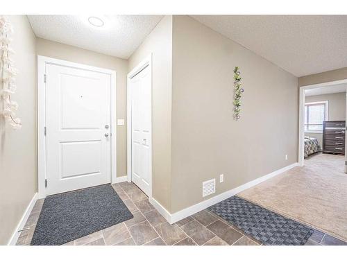 218-15 Saddlestone Way Ne, Calgary, AB - Indoor Photo Showing Other Room