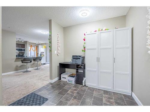 218-15 Saddlestone Way Ne, Calgary, AB - Indoor Photo Showing Other Room