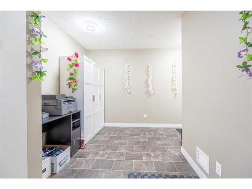 218-15 Saddlestone Way Ne, Calgary, AB - Indoor Photo Showing Other Room