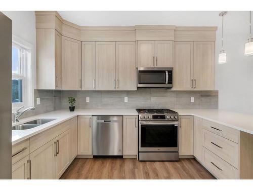 296 Cornerbrook Drive, Calgary, AB - Indoor Photo Showing Kitchen With Double Sink