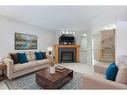 209 Douglas Glen Boulevard Se, Calgary, AB  - Indoor Photo Showing Living Room With Fireplace 