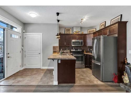 1007 Evanston Square Nw, Calgary, AB - Indoor Photo Showing Kitchen With Stainless Steel Kitchen