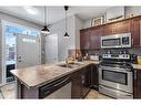 1007 Evanston Square Nw, Calgary, AB  - Indoor Photo Showing Kitchen With Double Sink 