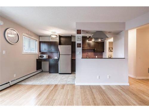 303-1826 11 Avenue Sw, Calgary, AB - Indoor Photo Showing Kitchen