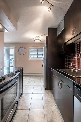 303-1826 11 Avenue Sw, Calgary, AB - Indoor Photo Showing Kitchen