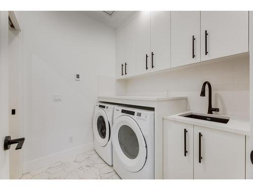 25 Timberline Court Sw, Calgary, AB - Indoor Photo Showing Laundry Room