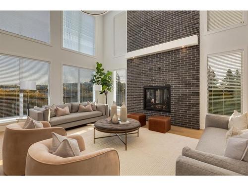 25 Timberline Court Sw, Calgary, AB - Indoor Photo Showing Living Room With Fireplace