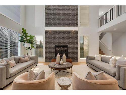 25 Timberline Court Sw, Calgary, AB - Indoor Photo Showing Living Room With Fireplace