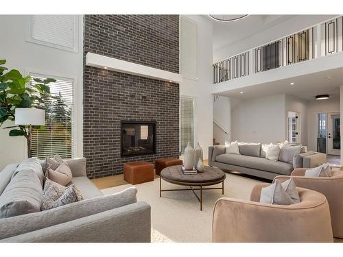 25 Timberline Court Sw, Calgary, AB - Indoor Photo Showing Living Room With Fireplace