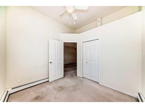 21-7720 39 Avenue Nw, Calgary, AB - Indoor Photo Showing Laundry Room