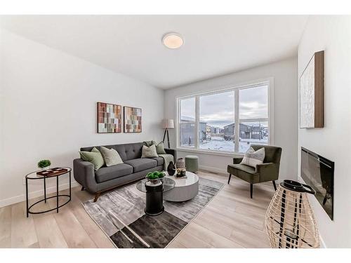 100 Wolf Hollow Villas Se, Calgary, AB - Indoor Photo Showing Living Room