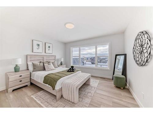 100 Wolf Hollow Villas Se, Calgary, AB - Indoor Photo Showing Bedroom