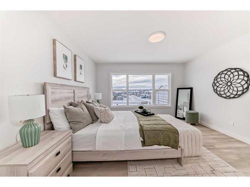 100 Wolf Hollow Villas Se, Calgary, AB - Indoor Photo Showing Bedroom