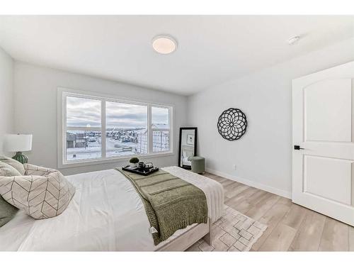 100 Wolf Hollow Villas Se, Calgary, AB - Indoor Photo Showing Bedroom