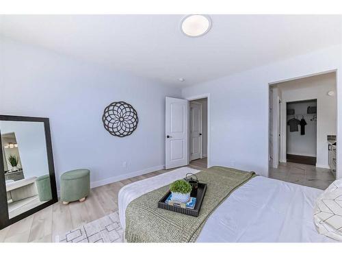 100 Wolf Hollow Villas Se, Calgary, AB - Indoor Photo Showing Bedroom