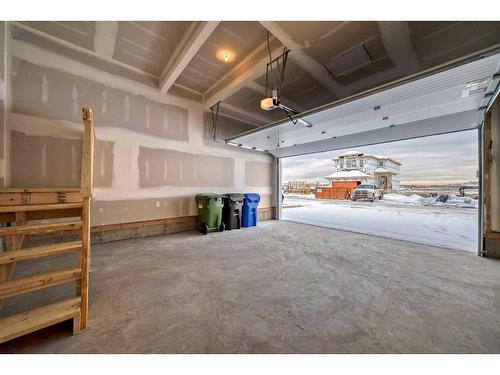 100 Wolf Hollow Villas Se, Calgary, AB - Indoor Photo Showing Garage