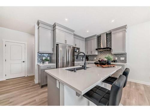 100 Wolf Hollow Villas Se, Calgary, AB - Indoor Photo Showing Kitchen With Upgraded Kitchen