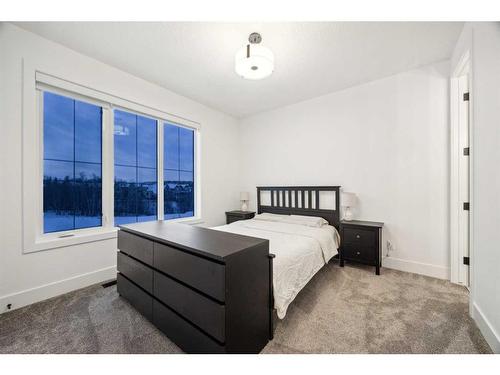 59 Timberline Point Sw, Calgary, AB - Indoor Photo Showing Bedroom