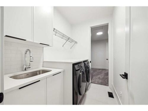 59 Timberline Point Sw, Calgary, AB - Indoor Photo Showing Laundry Room