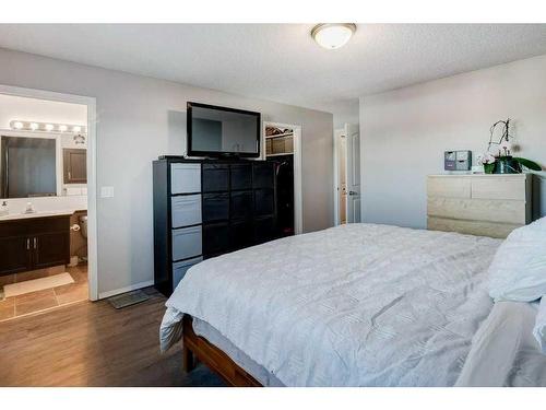 62 Jensen Heights Place Ne, Airdrie, AB - Indoor Photo Showing Bedroom