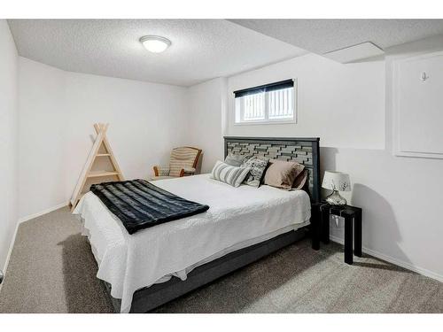 62 Jensen Heights Place Ne, Airdrie, AB - Indoor Photo Showing Bedroom