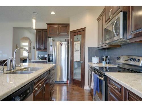 405 Taralake Landing Ne, Calgary, AB - Indoor Photo Showing Kitchen With Double Sink With Upgraded Kitchen