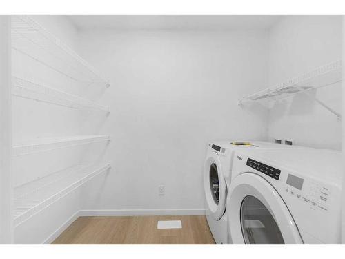 296 Hotchkiss Drive Se, Calgary, AB - Indoor Photo Showing Laundry Room