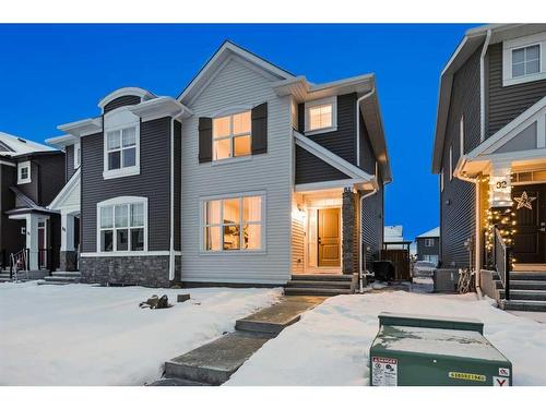 84 Wolf Gate, Okotoks, AB - Outdoor With Facade