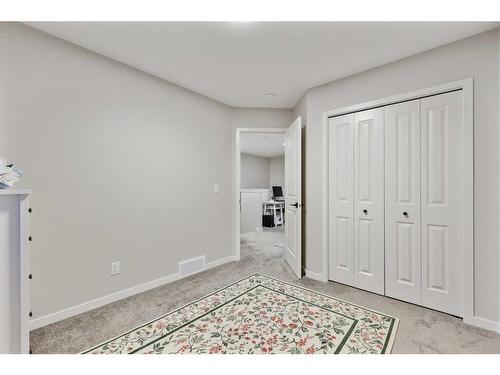 84 Wolf Gate, Okotoks, AB - Indoor Photo Showing Other Room