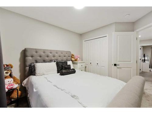 84 Wolf Gate, Okotoks, AB - Indoor Photo Showing Bedroom