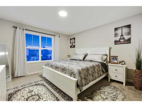 84 Wolf Gate, Okotoks, AB - Indoor Photo Showing Bedroom