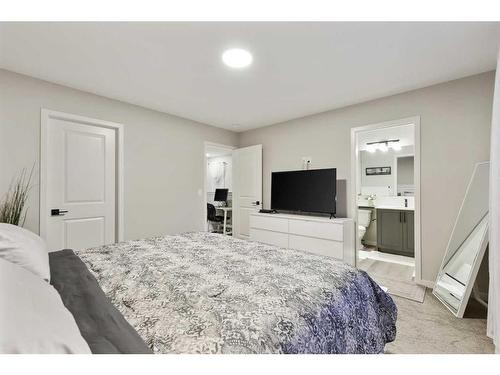 84 Wolf Gate, Okotoks, AB - Indoor Photo Showing Bedroom