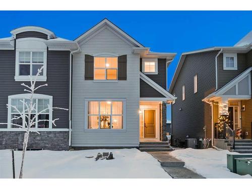 84 Wolf Gate, Okotoks, AB - Outdoor With Facade