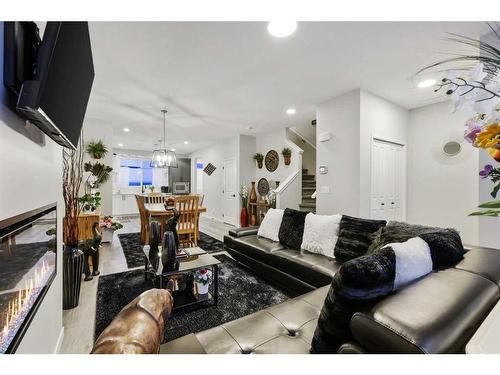 84 Wolf Gate, Okotoks, AB - Indoor Photo Showing Living Room