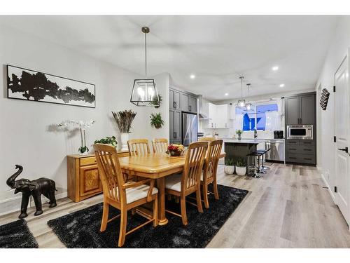 84 Wolf Gate, Okotoks, AB - Indoor Photo Showing Dining Room