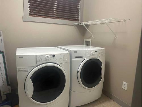 85 Sherwood Common Nw, Calgary, AB - Indoor Photo Showing Laundry Room