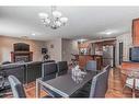 85 Sherwood Common Nw, Calgary, AB  - Indoor Photo Showing Dining Room With Fireplace 