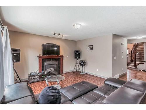 85 Sherwood Common Nw, Calgary, AB - Indoor Photo Showing Living Room With Fireplace