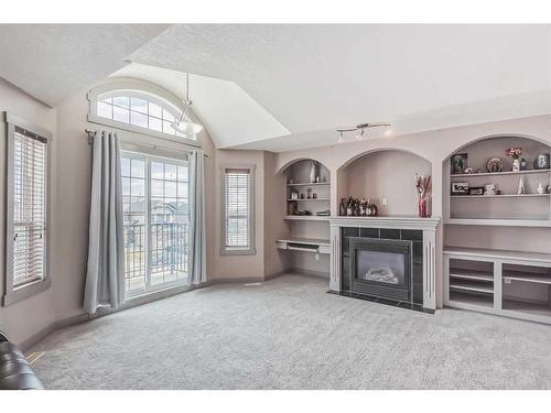 85 Sherwood Common Nw, Calgary, AB - Indoor With Fireplace