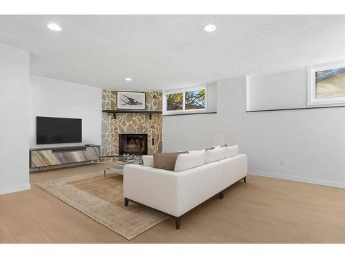 524 Midridge Drive Se, Calgary, AB - Indoor Photo Showing Living Room With Fireplace