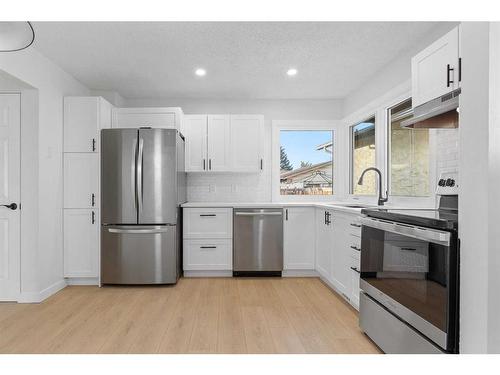 524 Midridge Drive Se, Calgary, AB - Indoor Photo Showing Kitchen With Stainless Steel Kitchen