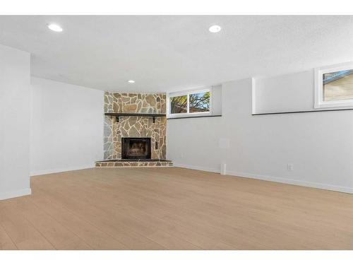 524 Midridge Drive Se, Calgary, AB - Indoor Photo Showing Living Room With Fireplace