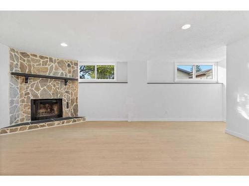 524 Midridge Drive Se, Calgary, AB - Indoor Photo Showing Living Room With Fireplace