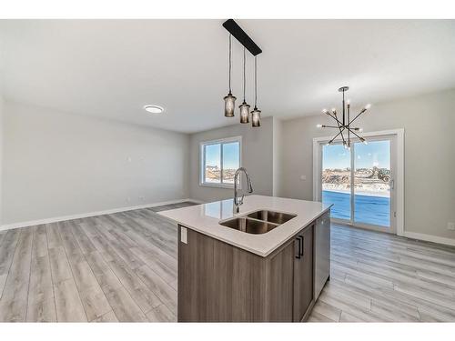 58 Cobbleridge Place Sw, Airdrie, AB - Indoor Photo Showing Kitchen With Double Sink