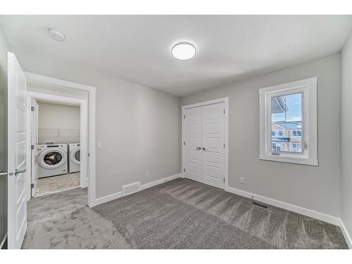 58 Cobbleridge Place Sw, Airdrie, AB - Indoor Photo Showing Laundry Room