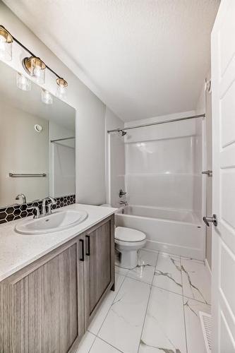 58 Cobbleridge Place Sw, Airdrie, AB - Indoor Photo Showing Bathroom