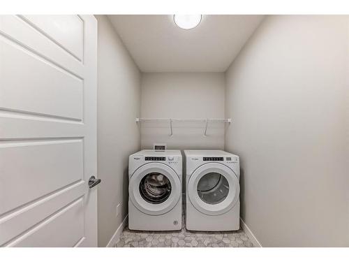 58 Cobbleridge Place Sw, Airdrie, AB - Indoor Photo Showing Laundry Room