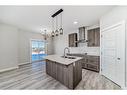 58 Cobbleridge Place Sw, Airdrie, AB  - Indoor Photo Showing Kitchen With Double Sink With Upgraded Kitchen 